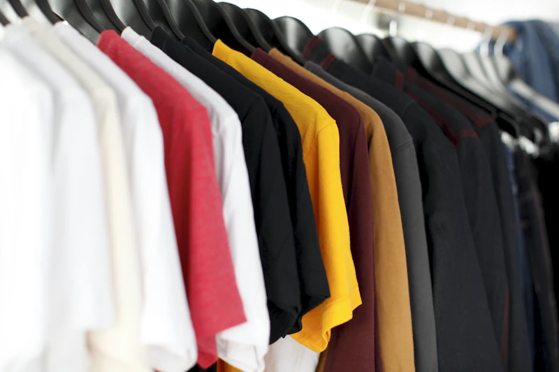Laundered shirts hanging in a row