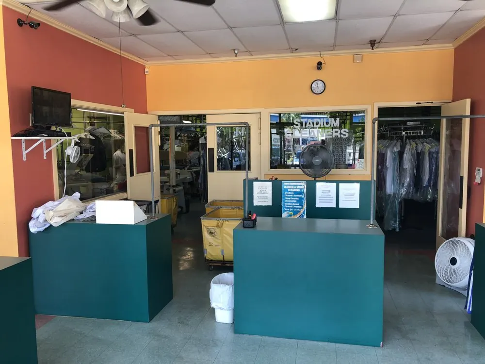 The counter inside a Stadium Dry Cleaners store