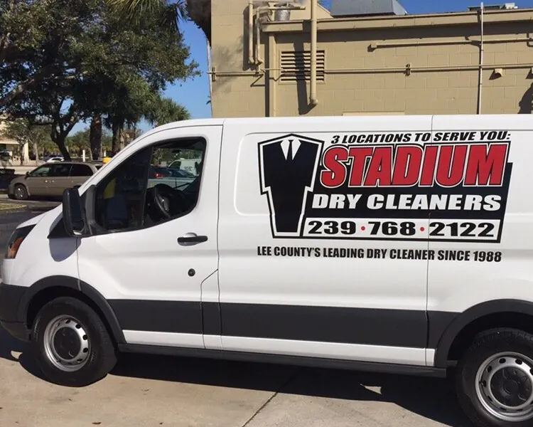 A Stadium Dry Cleaners van