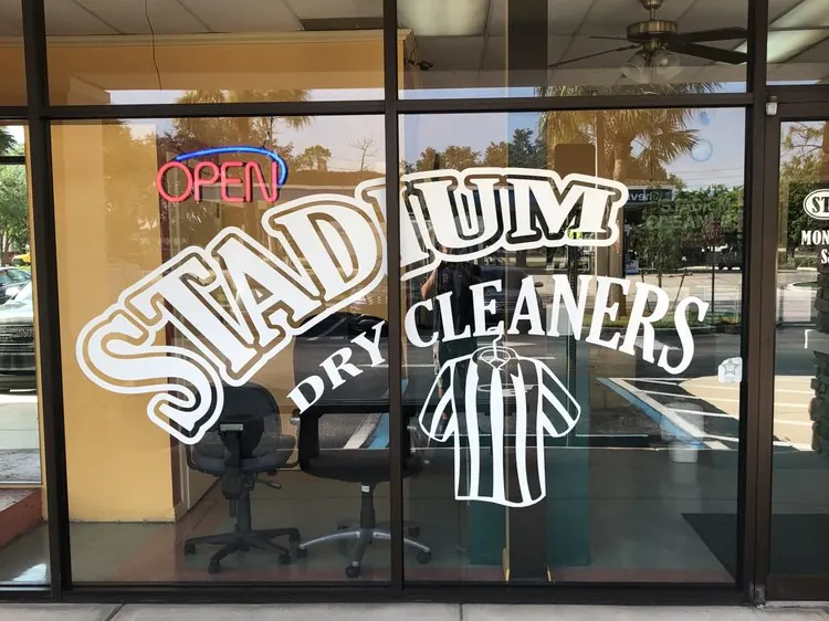The Stadium Dry Cleaners window decal